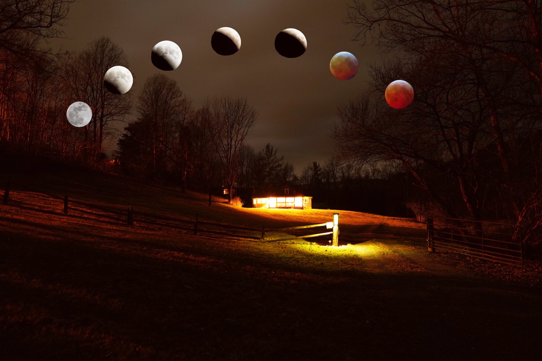 Lunar eclipse composite over a Virginia cabin